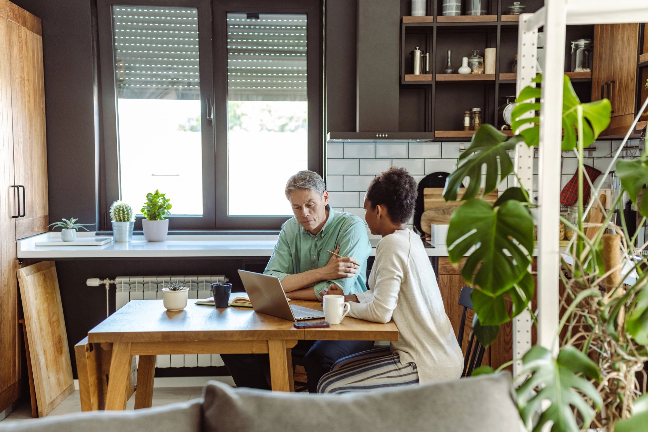 Clients reviewing home financing options together