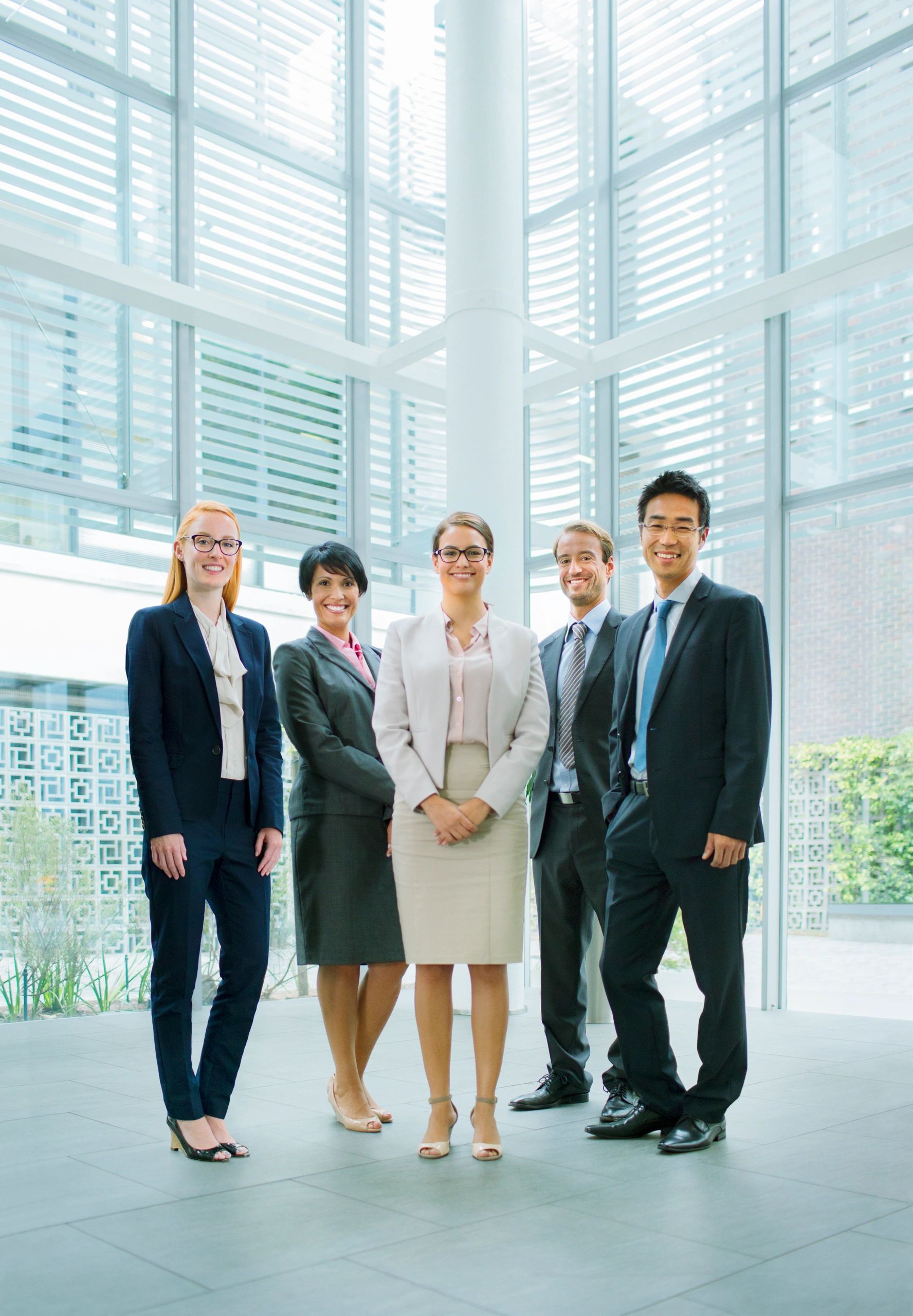 Business team gathered in office building